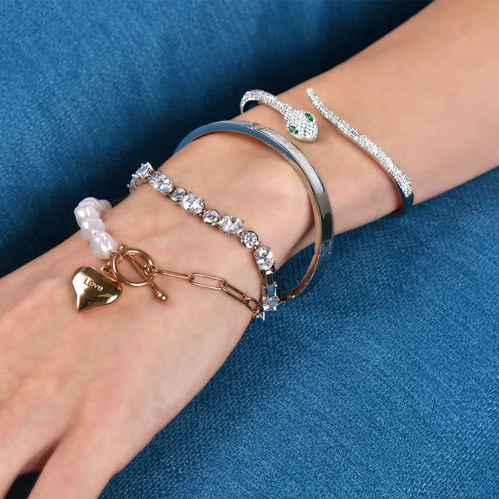 Modest Hinged Bangle in High Polish Stainless Steel